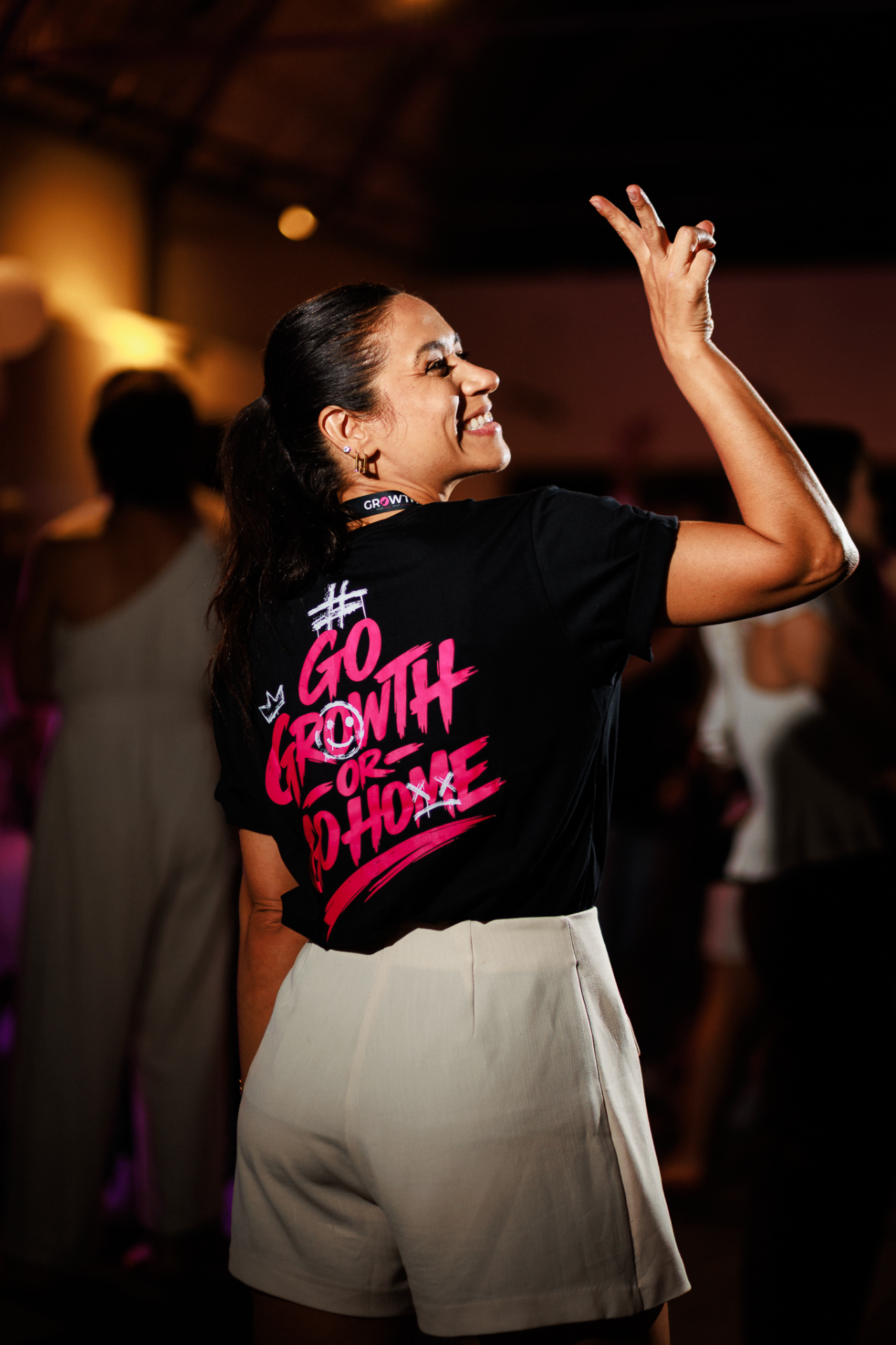 Membro do GrowthClub vestindo a camiseta