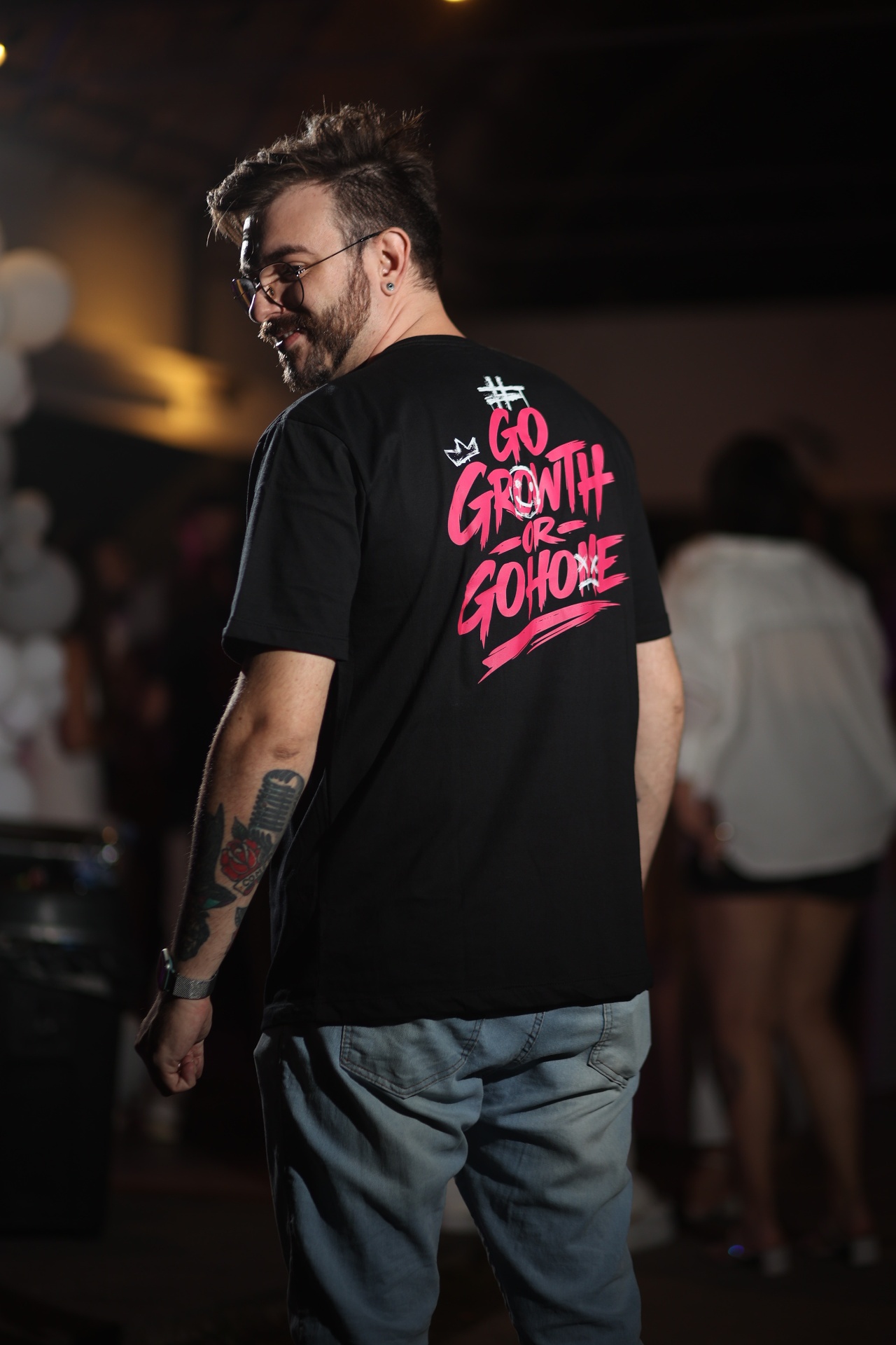 Membro vestindo a camiseta Go Growth or Go Home